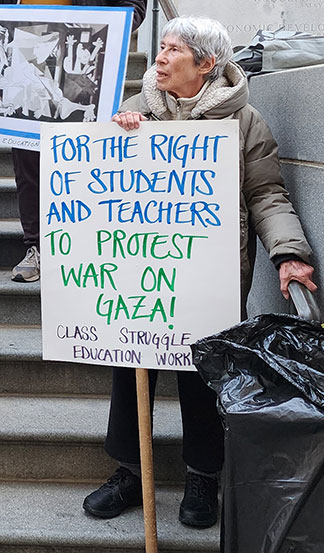 Marjorie Stamberg at protest called by Class Struggle
              Education Workers outside NYC Department of Education
              headquarters on 16 November 2023 protesting gag order by
              chancellor that sought to suppress solidarity with Gaza by
              teachers and staff.
